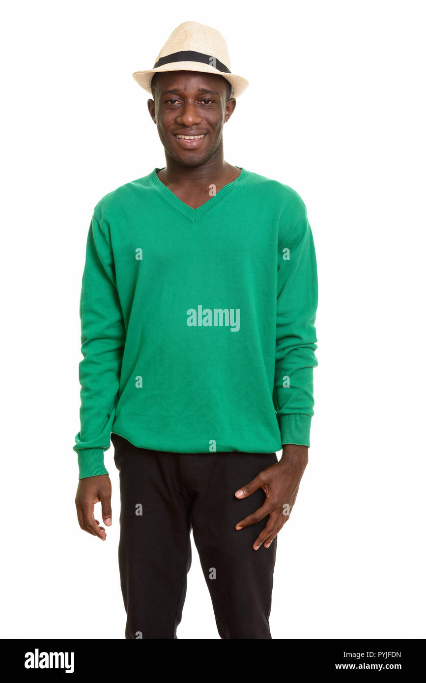 Young happy African man smiling and wearing hat Stock Photo