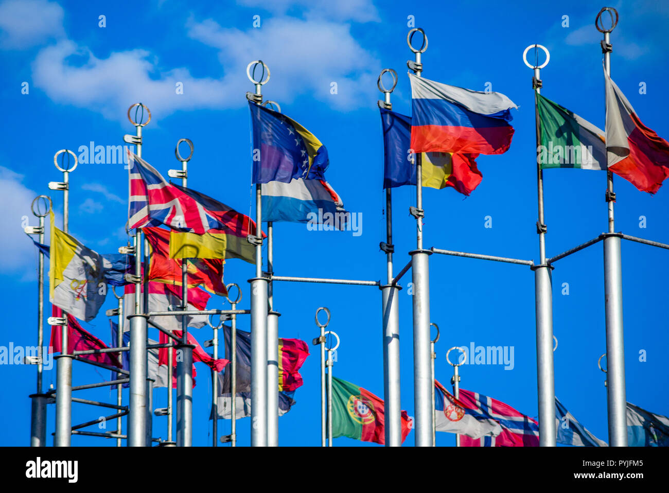 Flags of European countries on flagpoles against the blue sky Stock ...