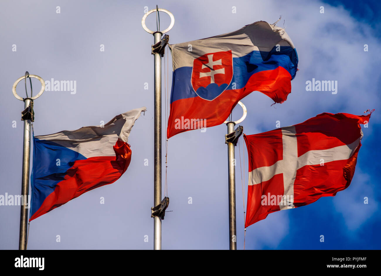 Flags of European countries on flagpoles against the blue sky Stock ...