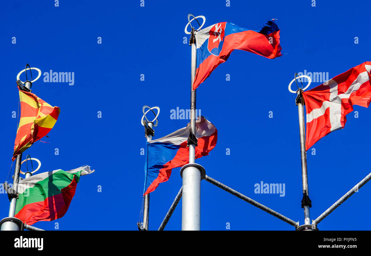Flags of European countries on flagpoles against the blue sky Stock ...