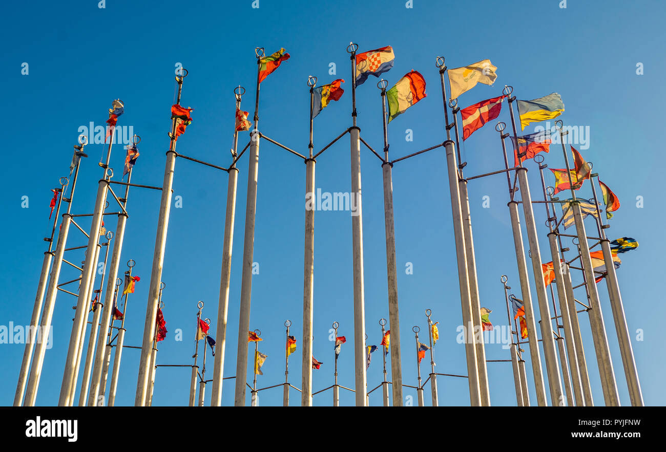 Flags of European countries on flagpoles against the blue sky Stock ...