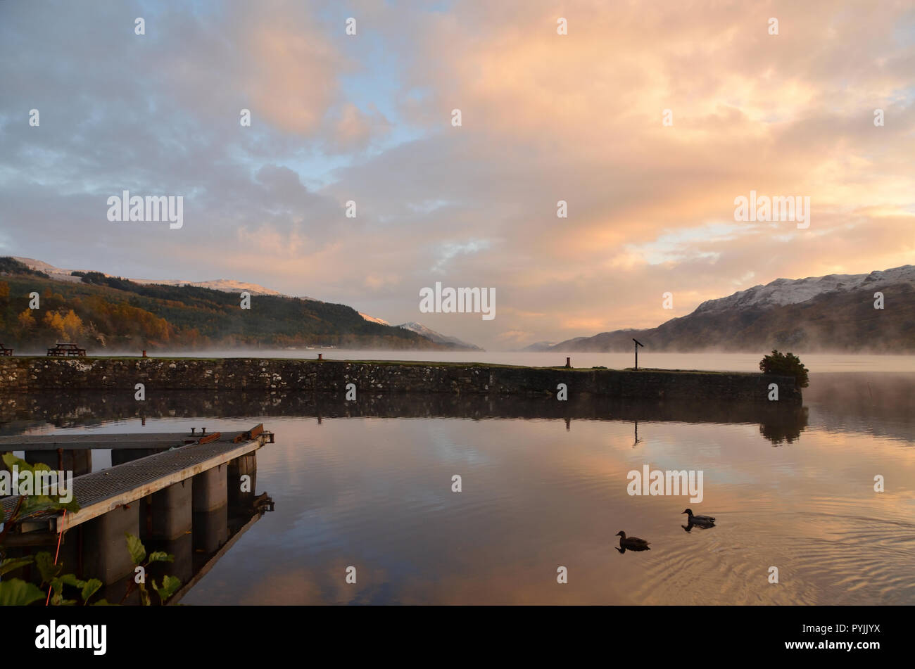 View from Fort Augustus at dawn looking straight down the Great Glen in Scotland Stock Photo