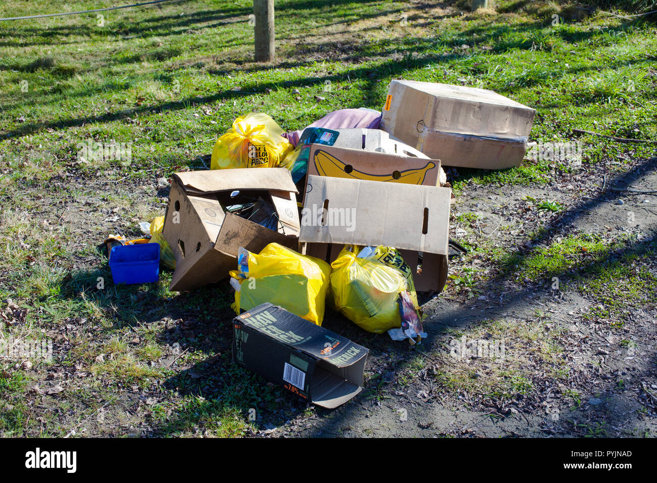 Household Rubbish dumped beside a River Stock Photo Alamy