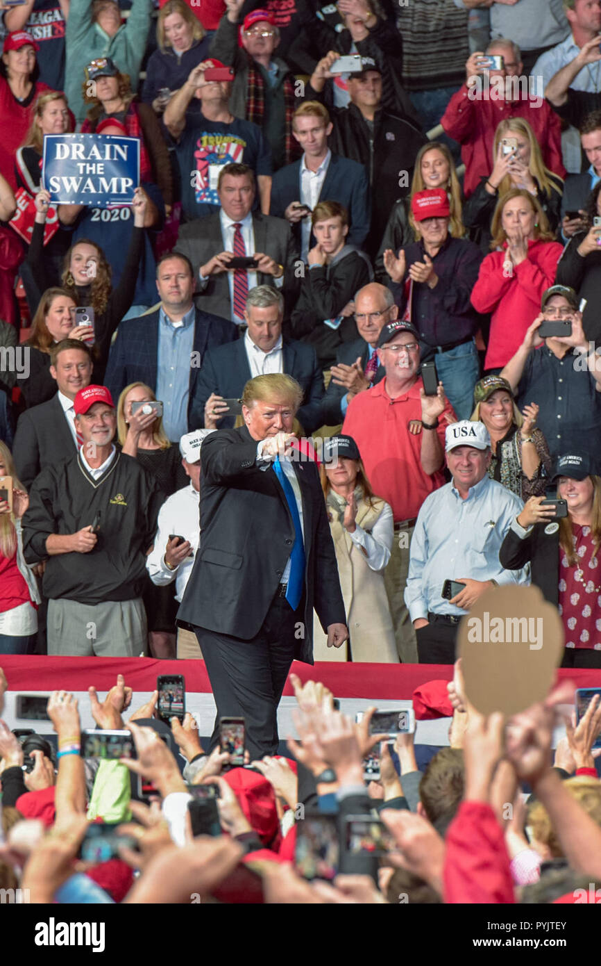 Charlotte, NC, USA. 26 Oct 2018. US President Trump attends a MAGA Rally to campaign for 9th District House Candidate, Mark Harris. Trump's supporters braved cold weather and hard rain, some arriving over a day early, to hear the president speak.  Photo Credit: Castle Light Images / Alamy Live News Stock Photo