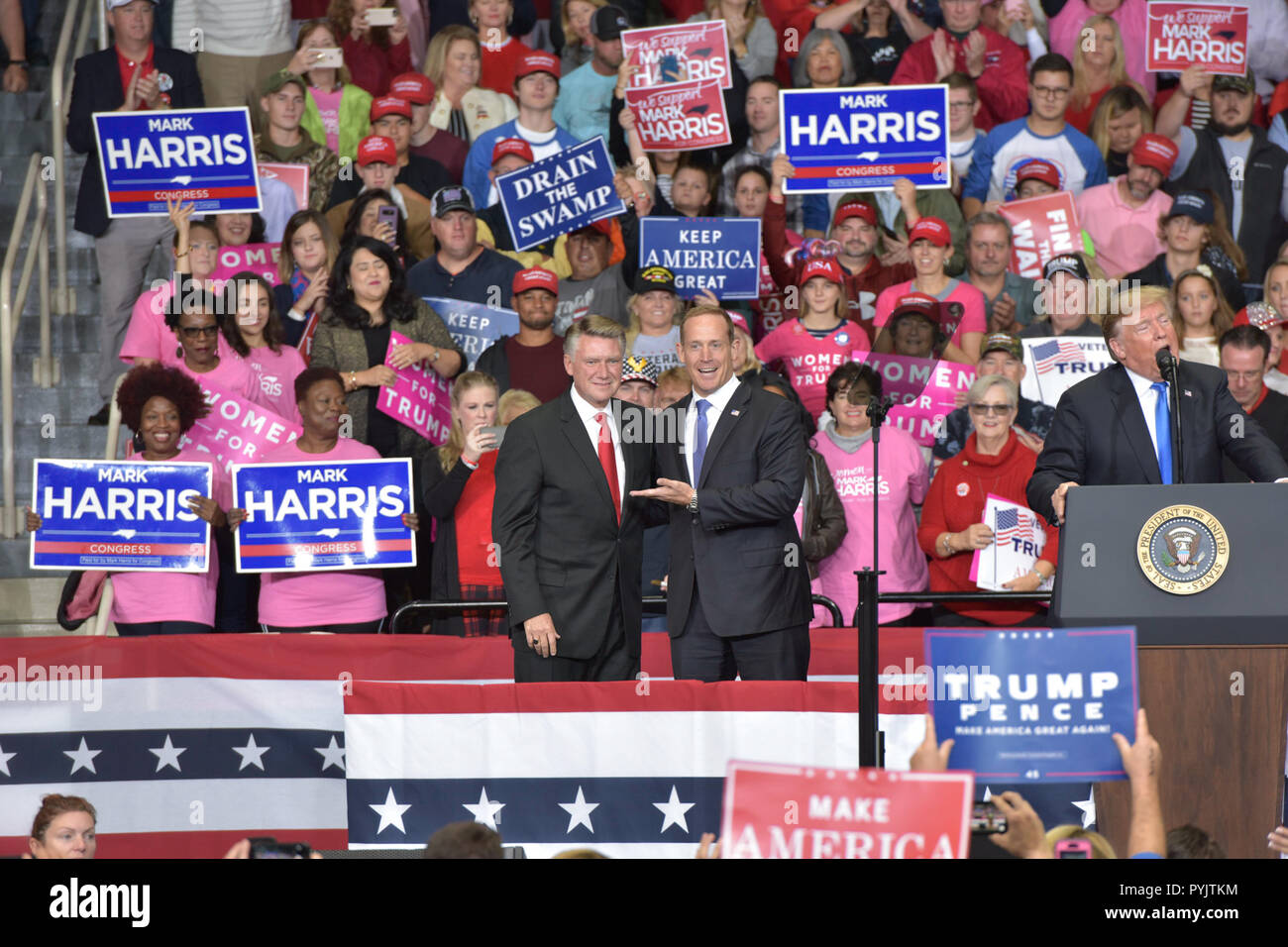 Charlotte, NC, USA. 26 Oct 2018. US President Trump attends a MAGA Rally to campaign for 9th District House Candidate, Mark Harris. Trump's supporters braved cold weather and hard rain, some arriving over a day early, to hear the president speak.  Photo Credit: Castle Light Images / Alamy Live News Stock Photo