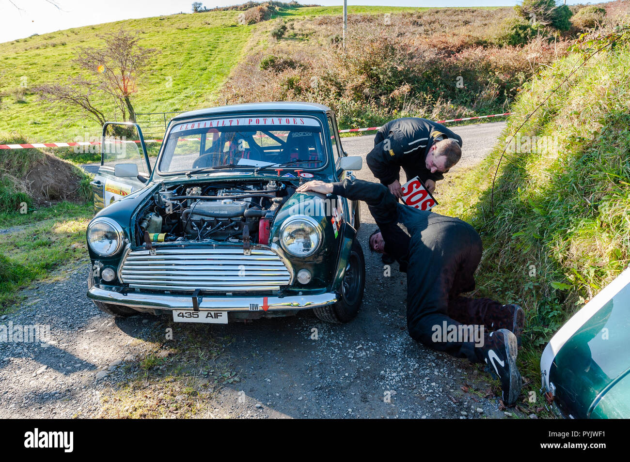 Ballydehob, West Cork, Ireland. Driver Maurice Whelton and his Navigator Ivan Bennett pulled out of the rally due to a broken shock on their Austin Mini during a stage of the Fastnet Rally 2018 organised by Skibbereen Car Club. Credit: Andy Gibson/Alamy Live News. Stock Photo