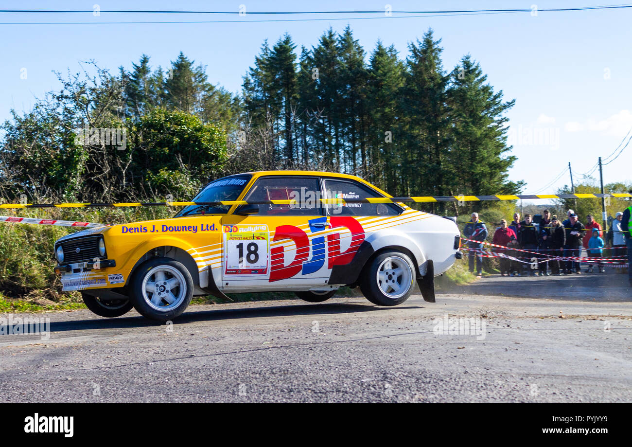 Bantry, West Cork, Ireland, October 28th 2018. A fine clear day greeted the start of the 2018 Fastnet Rally today, allowing the drivers to make the most of the dry conditions while racing on the twists and turns of the country roads around Ballydehob and Bantry.Leonard Downey and Mark Murphy in the MK2 Escort fly through station 16 with wheels of the road. Credit: aphperspective/Alamy Live News Stock Photo