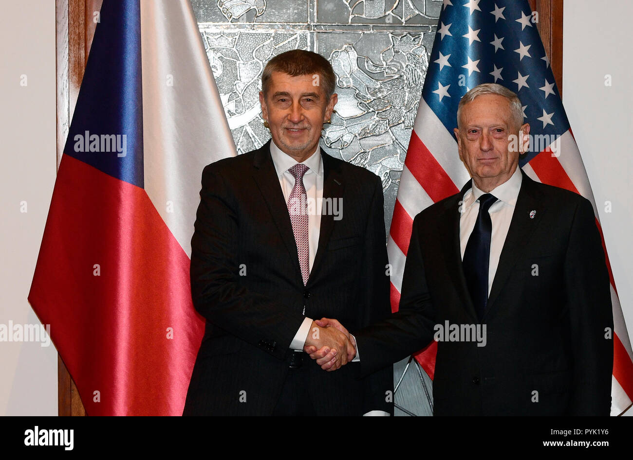 Prague, Czech Republic. 28th Oct, 2018. U.S. Defense Secretary Jim Mattis, left, handshake with Czech Prime Minister Andrej Babis, right, during their meeting in Prague, Czech Republic, Sunday, October 28, 2018. Mattis arrives in Prague to mark the 100th anniversary of the 1918 creation of the Czechoslovak state. Credit: Roman Vondrous/CTK Photo/Alamy Live News Stock Photo