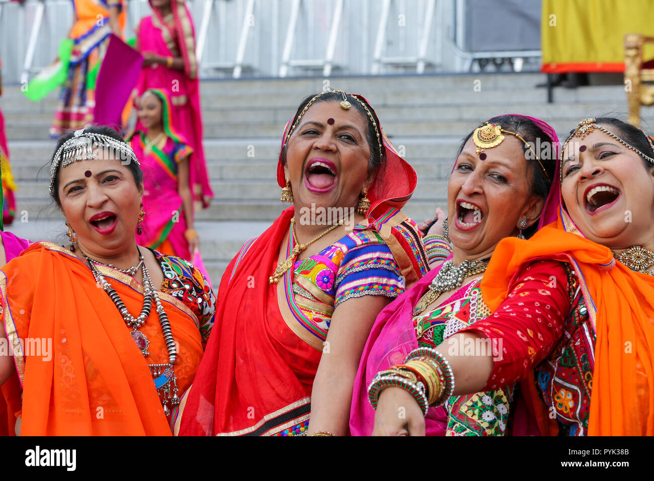 Trafalgar Square, London, UK. 28 Oct 2018 - Performers during the Mass Ghoomar Dance - a traditional Gujarati folk dance of the Bhil tribe performed in worship to Goddess Sarasvati, were the dancers twirling in and out of a wide circle.  Hundreds of Hindus, Sikhs, Jains and people from all communities attend Diwali celebrations in London - festival of light, Diwali in London is celebrated each year with a free concert of traditional religious and contemporary Asian music and dance.  Credit: Dinendra Haria/Alamy Live News Stock Photo