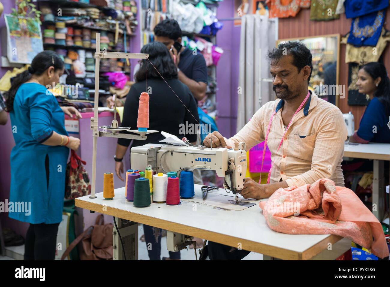 Singapore, Singapore. 19th Oct, 2018. An Indian tailor seen working on