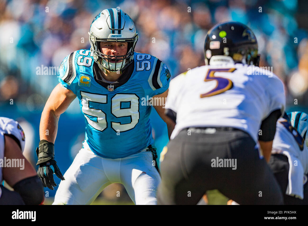 Carolina Panthers' Luke Kuechly #59 walks off the field against