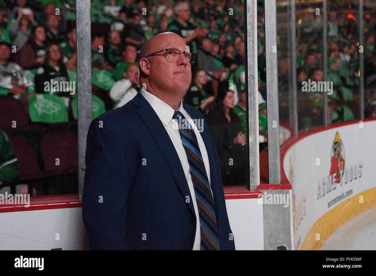 October 27, 2018 Minnesota Gophers Head Coach Bob Motzko watches a pre-game video before the NCAA men's US Hockey Hall of Fame game between the Minnesota Golden Gophers and the University of North Dakota Fighting Hawks at Orleans Arena in Las Vegas, NV. North Dakota defeated Minnesota 3 -1. Photo by Russell Hons/CSM Stock Photo