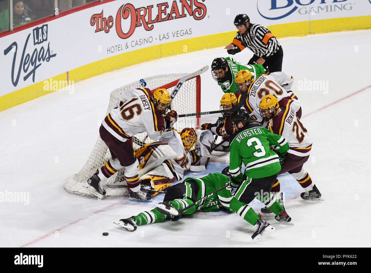 October 27, 2018 Players from both teams pile up in front of the goal during the NCAA men's US Hockey Hall of Fame game between the Minnesota Golden Gophers and the University of North Dakota Fighting Hawks at Orleans Arena in Las Vegas, NV. North Dakota defeated Minnesota 3 -1. Photo by Russell Hons/CSM Stock Photo