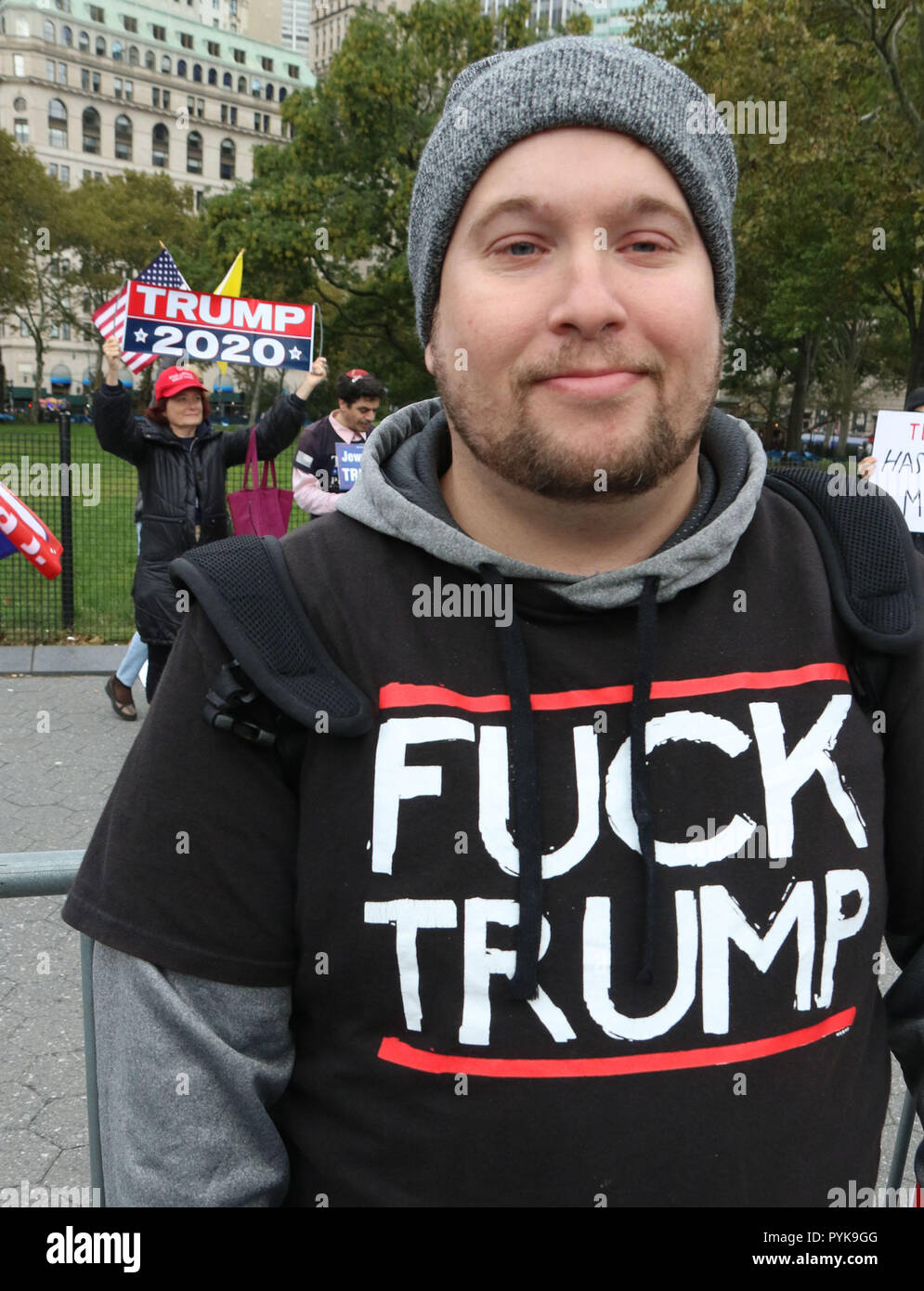 New York City, New York, USA. 28th Oct, 2018. An Activist Stands In