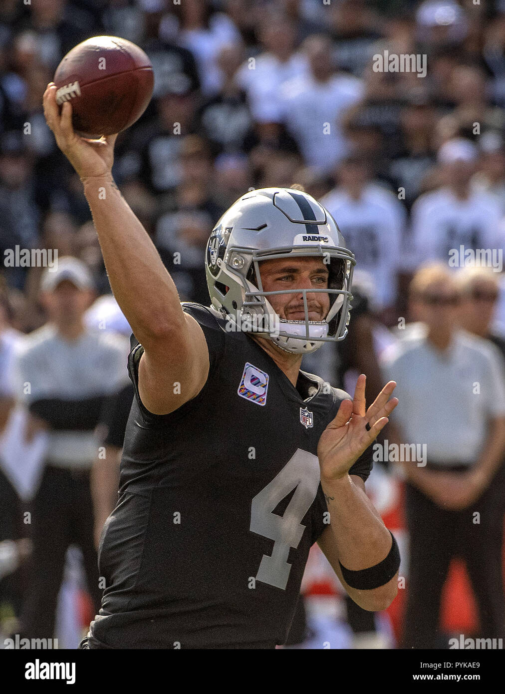 Oakland, California, USA. 28th Oct, 2018. Oakland Raiders quarterback Derek Carr (4) fires pass on Sunday, October 28, 2018, at Oakland-Alameda County Coliseum in Oakland, California. The Colts defeated the Raiders 42-28. Credit: Al Golub/ZUMA Wire/Alamy Live News Stock Photo