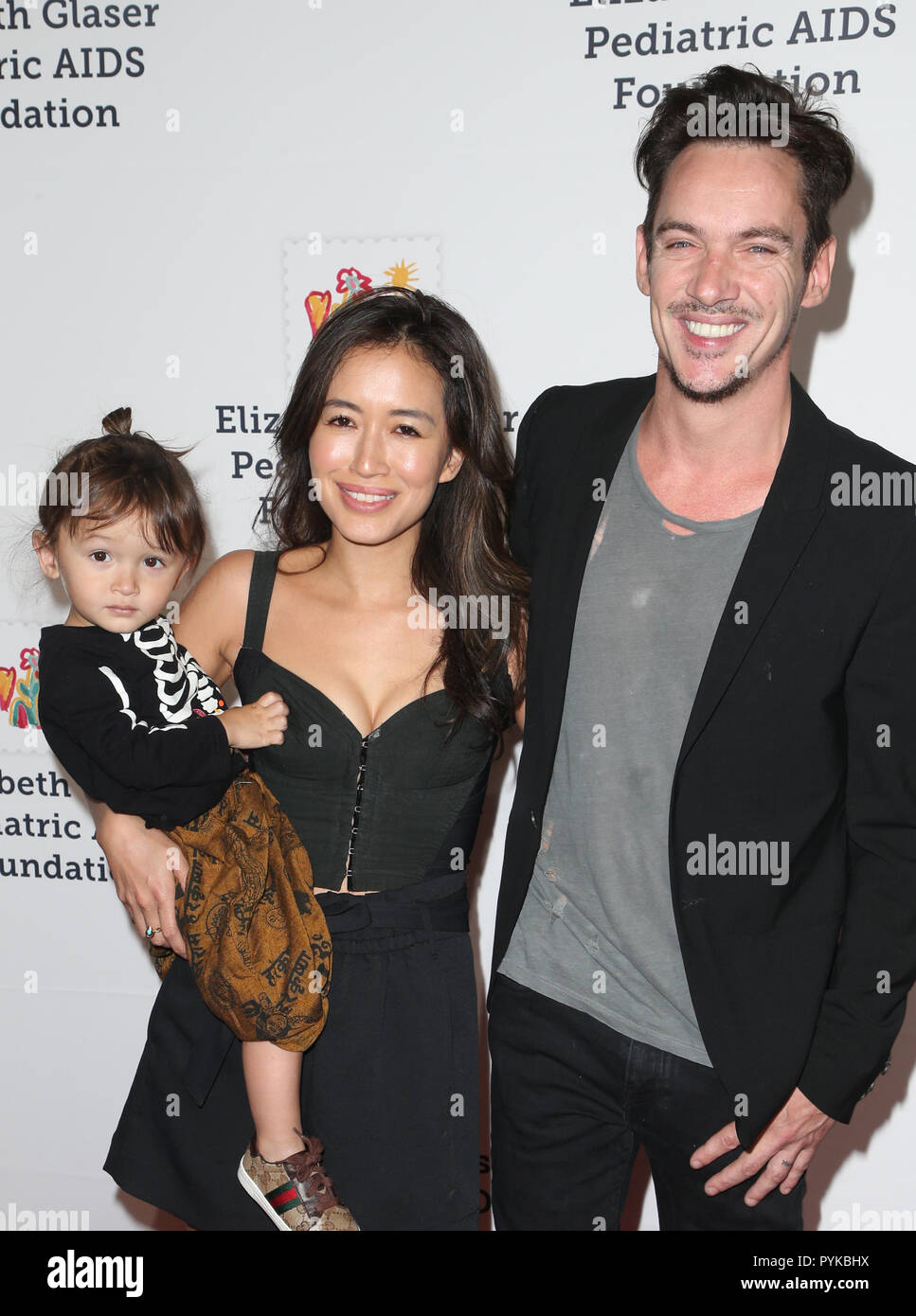 Culver City, Ca. 28th Oct, 2018. Jonathan Rhys Meyers, Mara Lane, Toco Lane Rhys Meyers, at the Elizabeth Glaser Pediatric AIDS Foundation 30th Anniversary at A Time for Heroes Family Festival at Smashbox Studios in Culver City, California on October 28, 2018. Credit: Faye Sadou/Media Punch/Alamy Live News Stock Photo