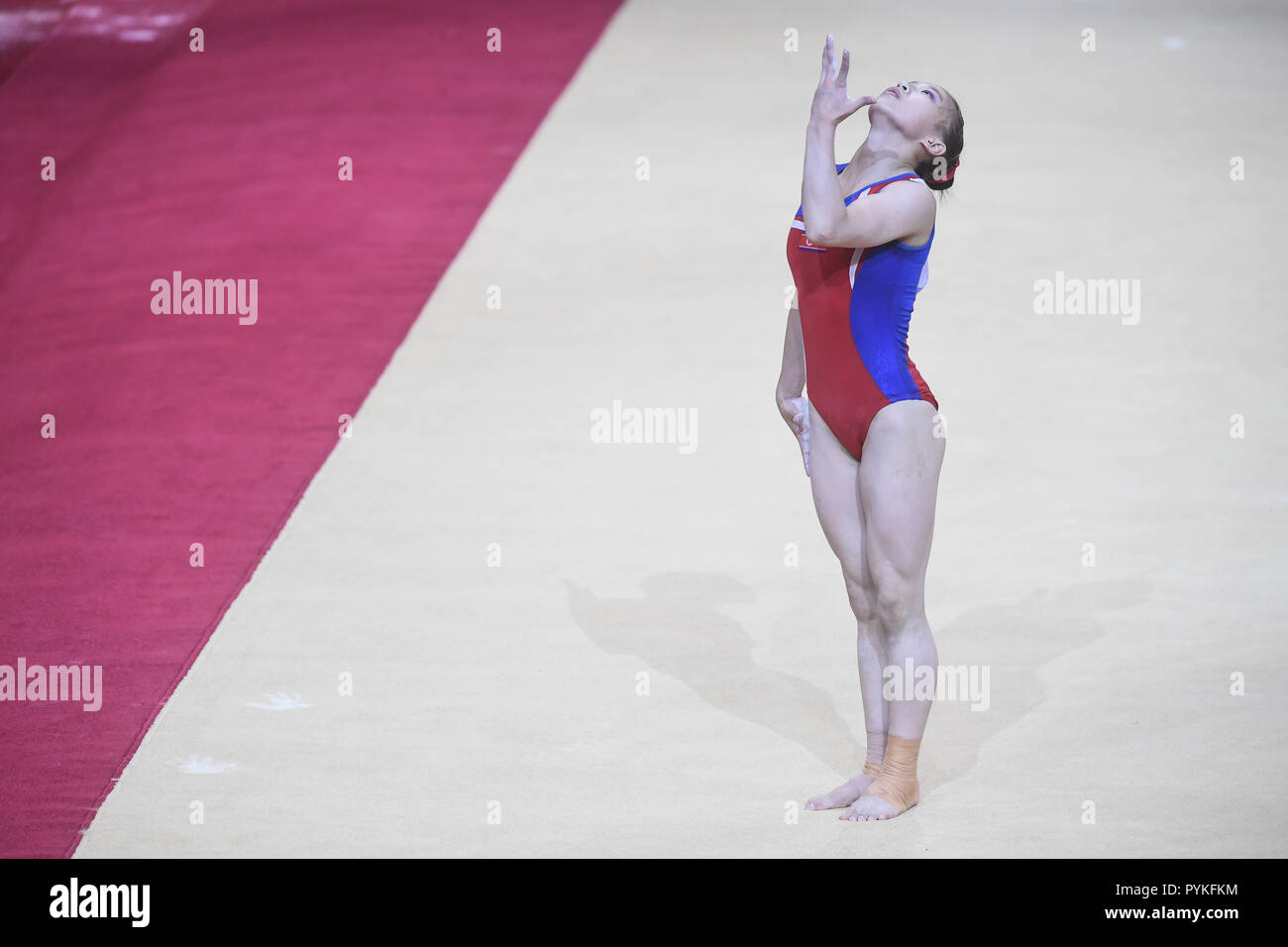 Doha, Qatar. 27th Oct, 2018. SU JONG KIM from North Korea competes on the floor exercise during the second day of preliminary competition held at the Aspire Dome in Doha, Qatar. Credit: Amy Sanderson/ZUMA Wire/Alamy Live News Stock Photo