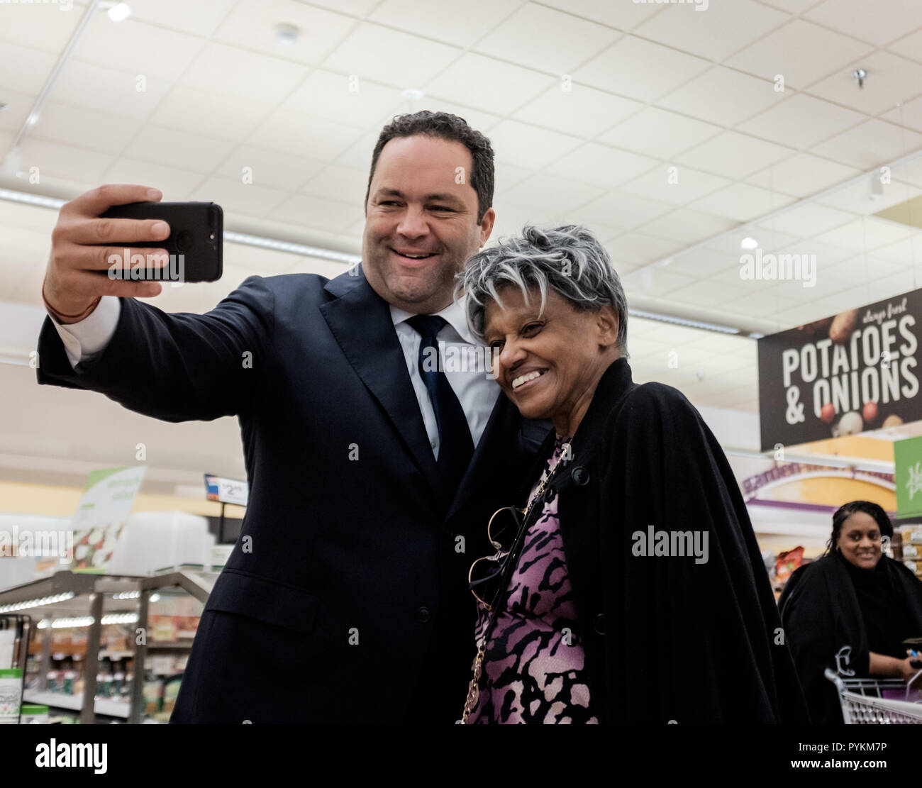 Largo, MD, USA. 26th Oct, 2018. Maryland Democratic Gubernatorial Candidate BENJAMIN JEALOUS takes a selfie with a potential voter at an event in Largo, MD on October 26, 2018. Credit: Michael A. McCoy/ZUMA Wire/Alamy Live News Stock Photo