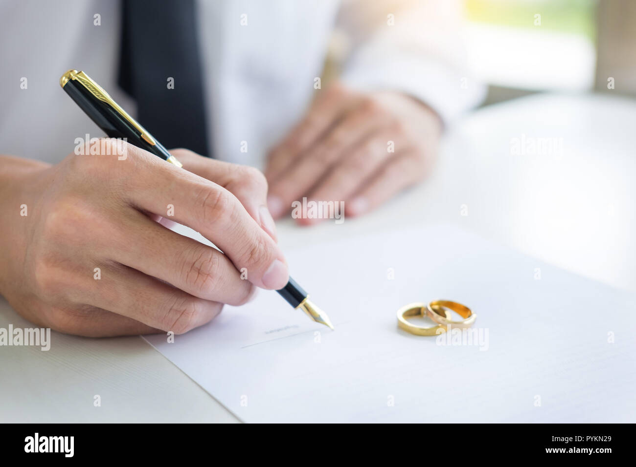 Signing a agreement man or of Closeup Contract ... premarital