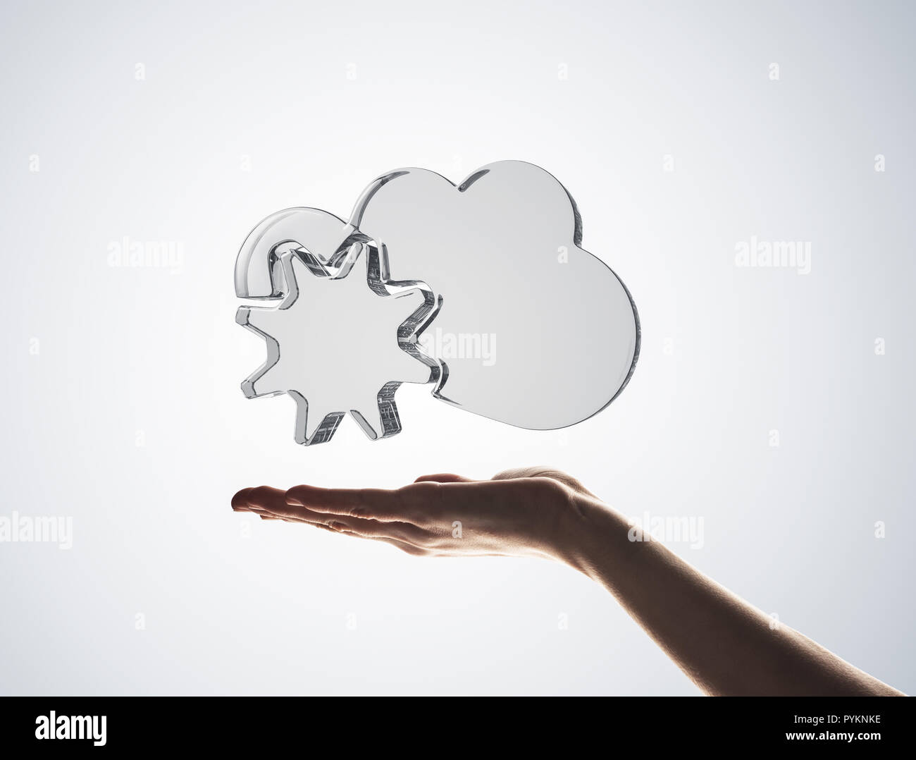 Cloud computing concept with glass symbol shown in hand Stock Photo