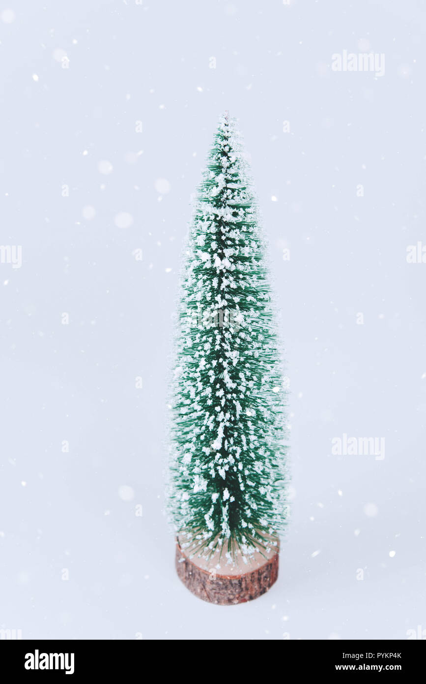 Christmas tree over light blue background Stock Photo - Alamy