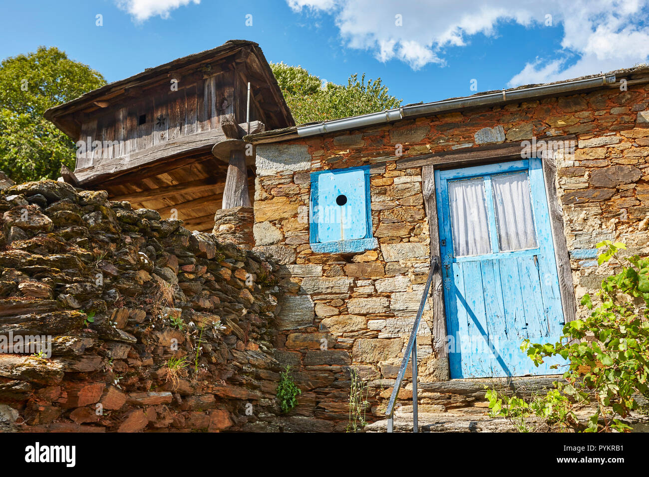 Traditional stone construction village with horreo storage in Asturias Stock Photo