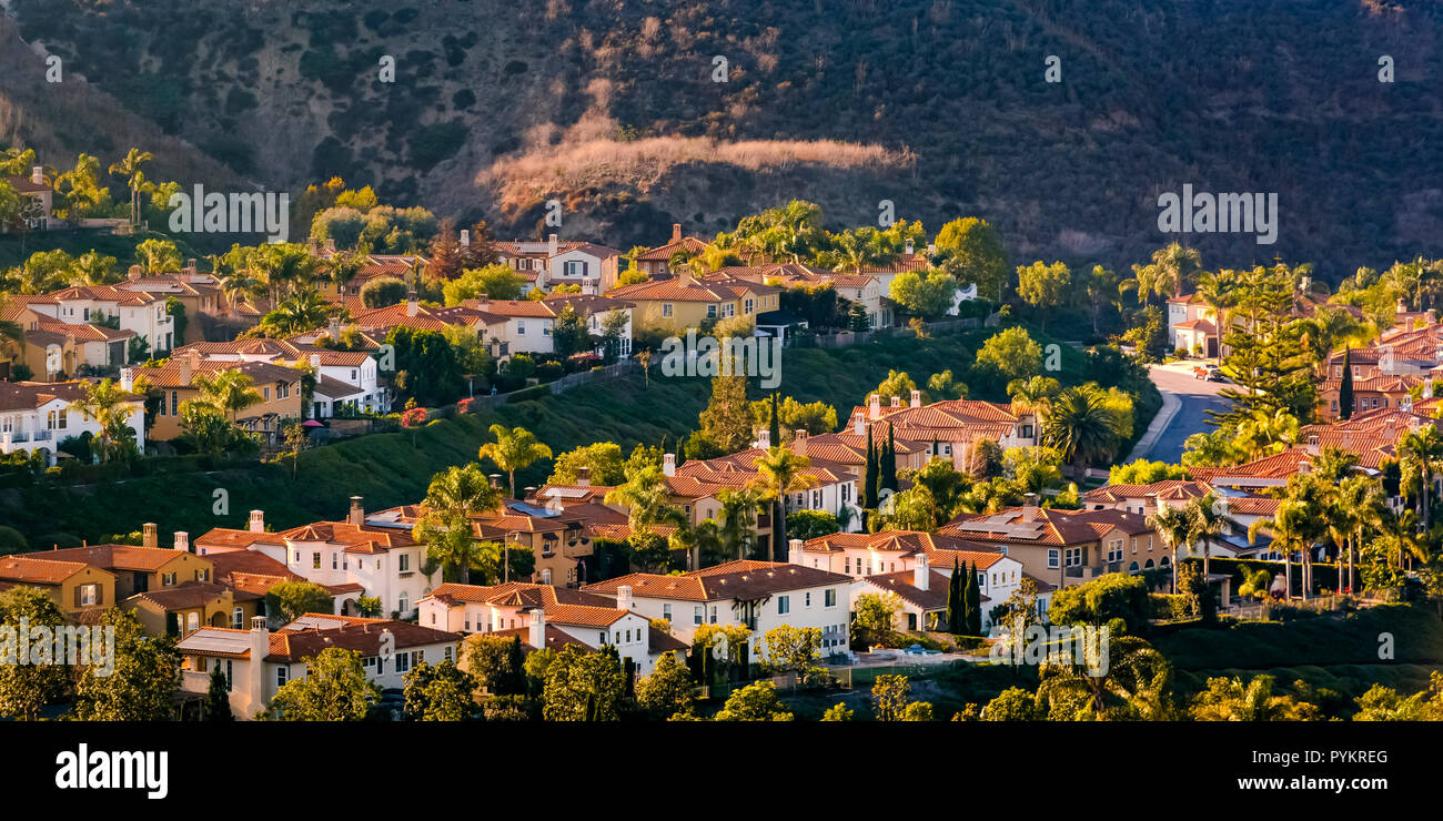 Sunlit homes on a hill in San Clemente California Stock Photo