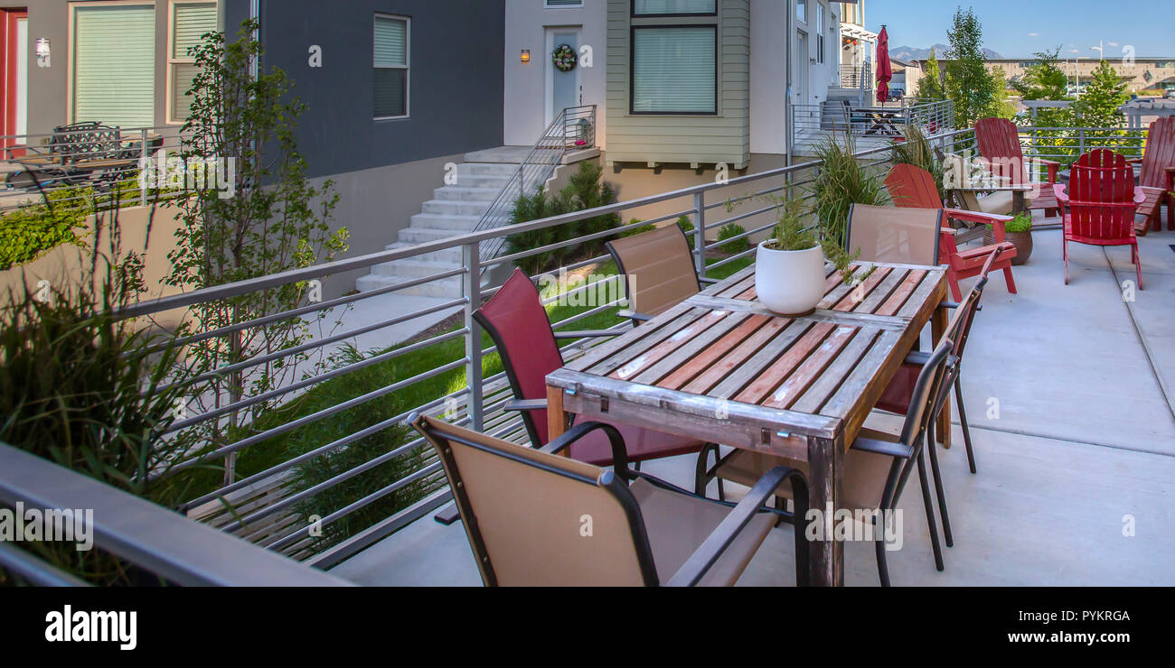 Table and chairs on a patio in Daybreak Utah Stock Photo Alamy
