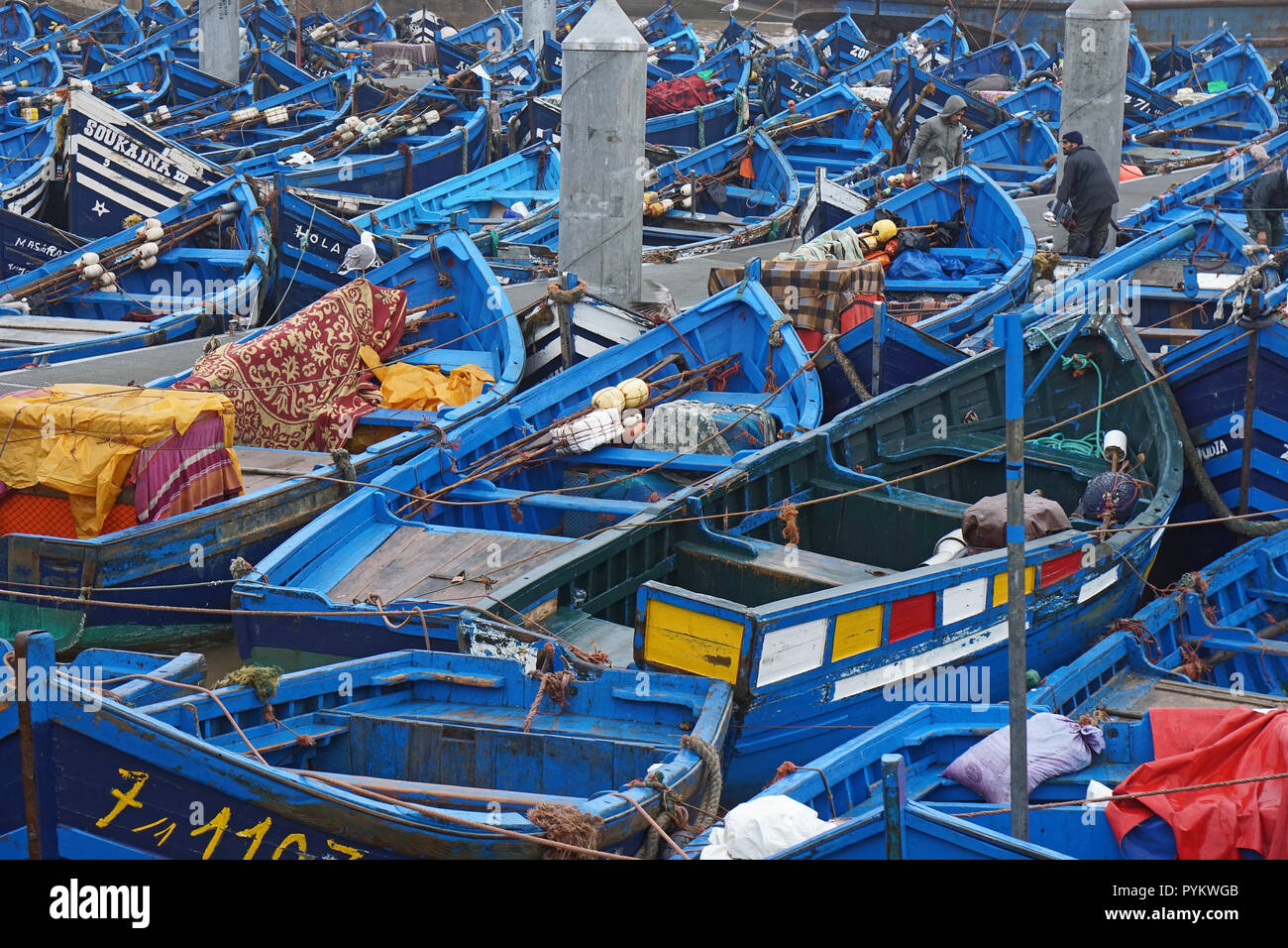 Blue wooden fishing boats in fishing port of Essaouira, Morocco, Africa Stock Photo
