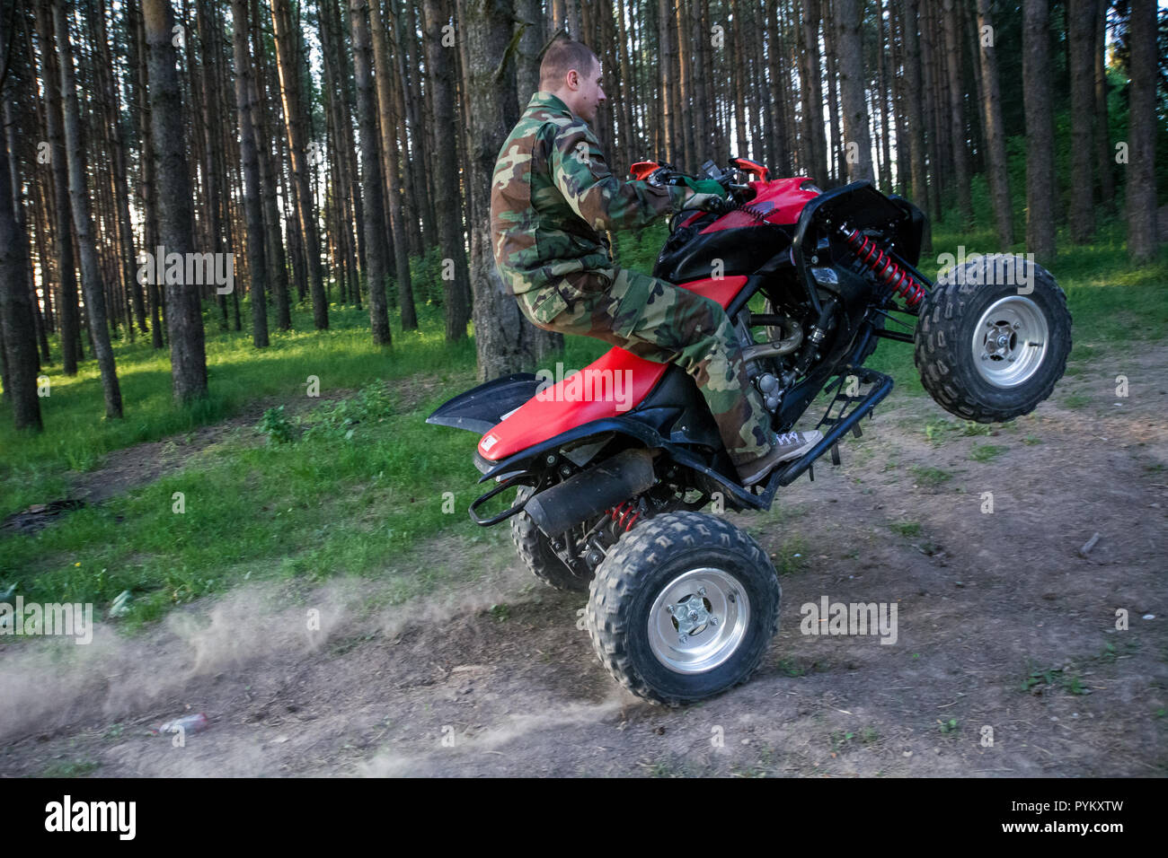 Moscow, Russia - May 17, 2014: ATV Rider in the action on Honda TRX700XX  Stock Photo - Alamy