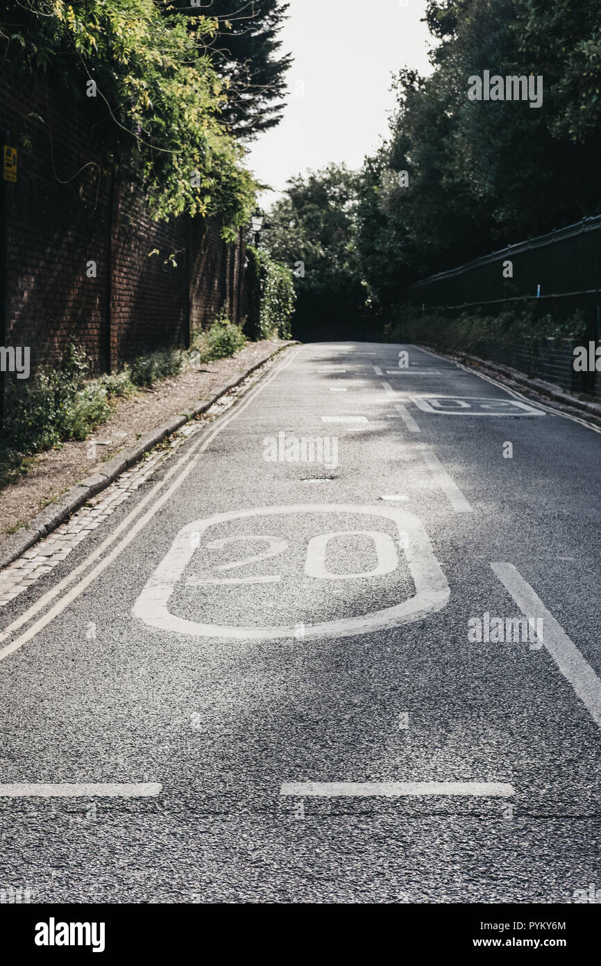 Twenty miles per hour speed limit sigh on the road in Hampstead, Borough of Camden, London, UK. Stock Photo