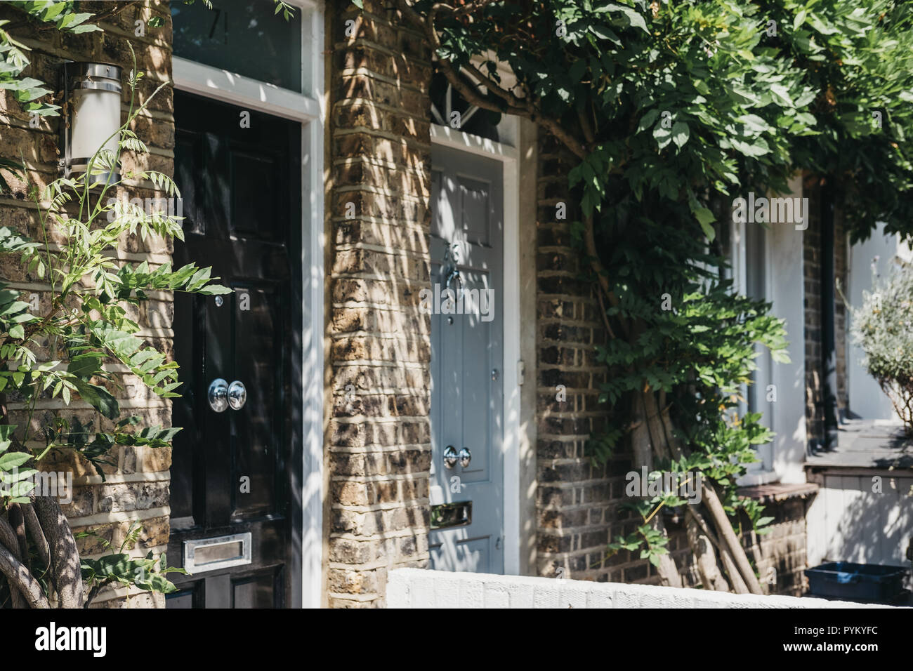Close up of wooden doors of a traditional Victorian house in Barnes