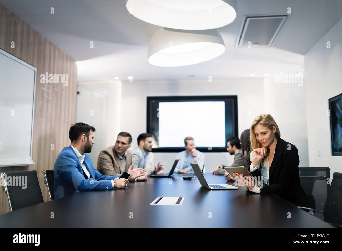 Picture of businesspeople having meeting in conference room Stock Photo ...