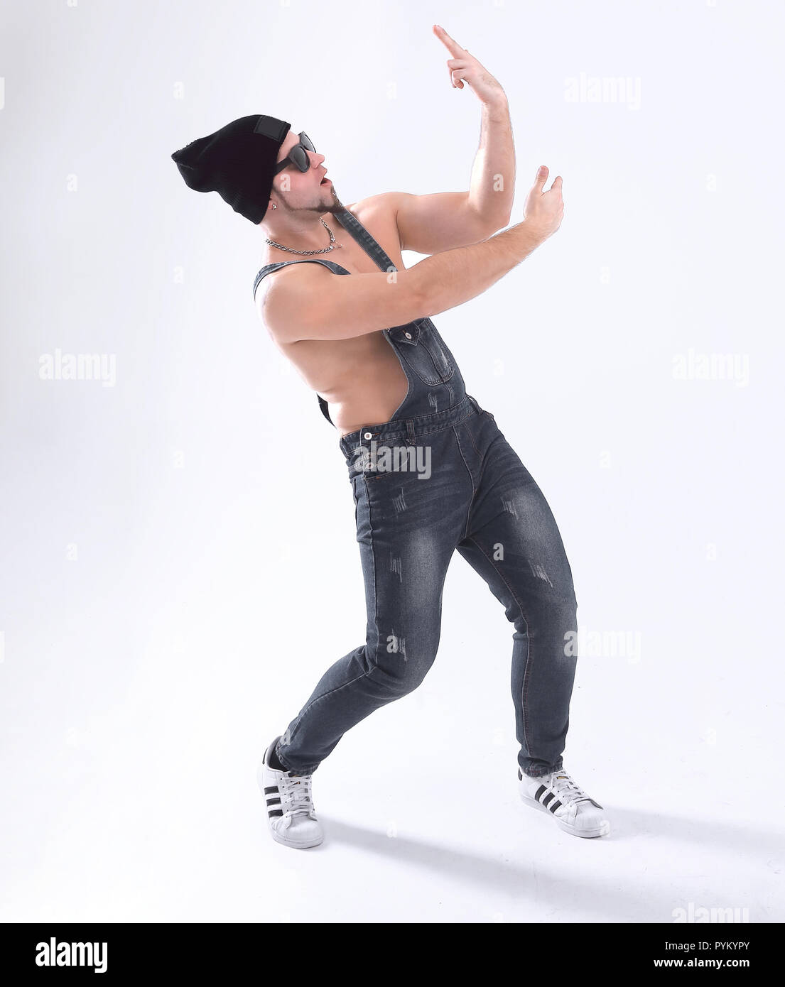 nice man dancing break dance in the Studio .isolated on white Stock