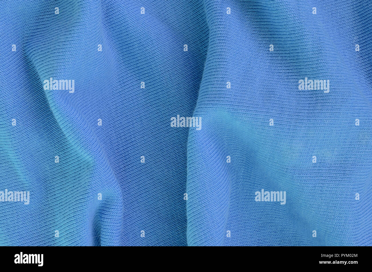 the texture of the fabric in blue color material for making shirts shirts making