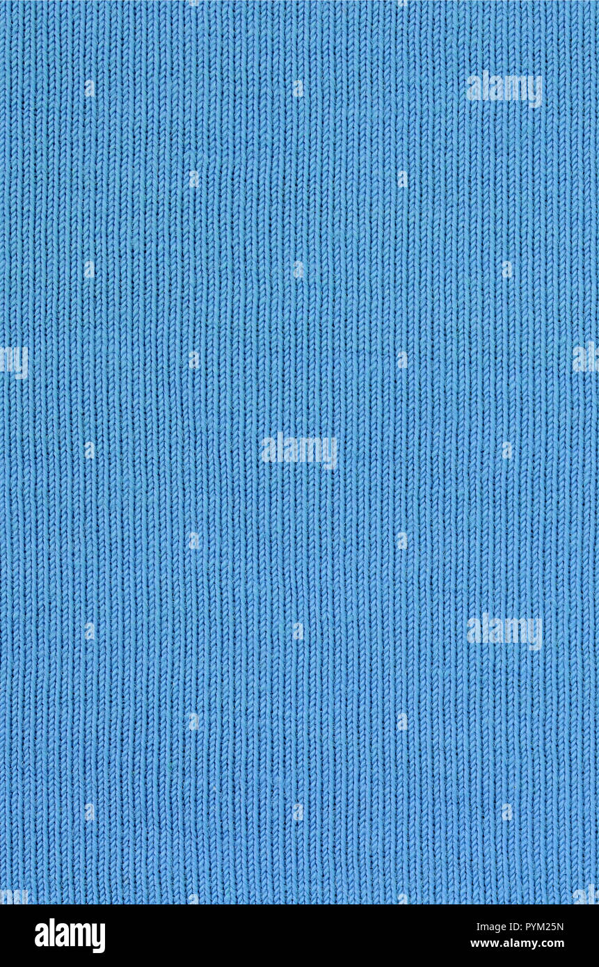 The texture of the fabric in blue color. Material for making shirts and ...