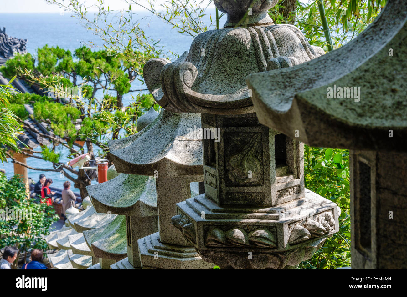 A line of decorative dovecots line a set of steps at Haedong Yonggungsa Temple at Busan in South korea.e Stock Photo