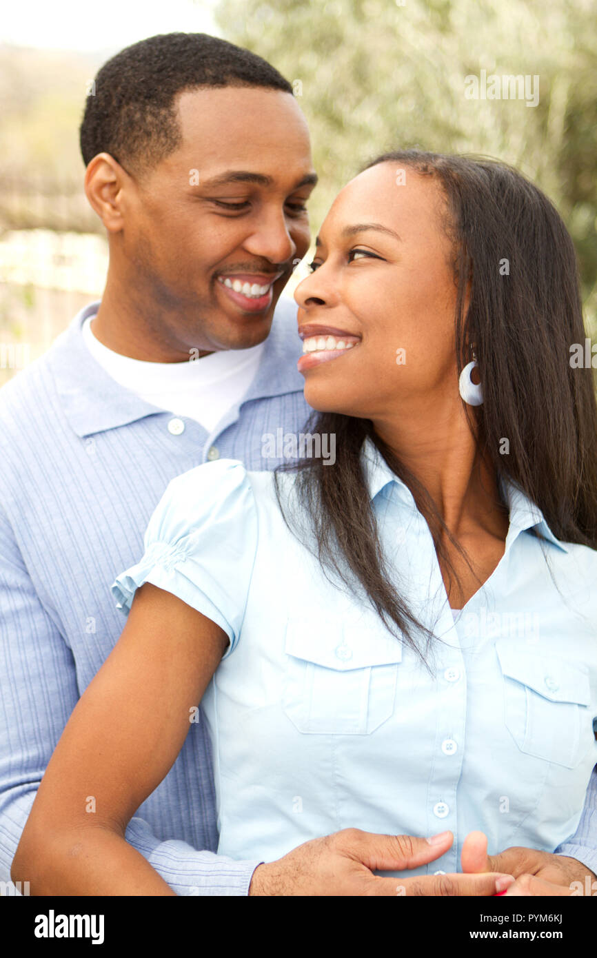 Portrait of a Happy African American couple smiling and hugging Stock ...
