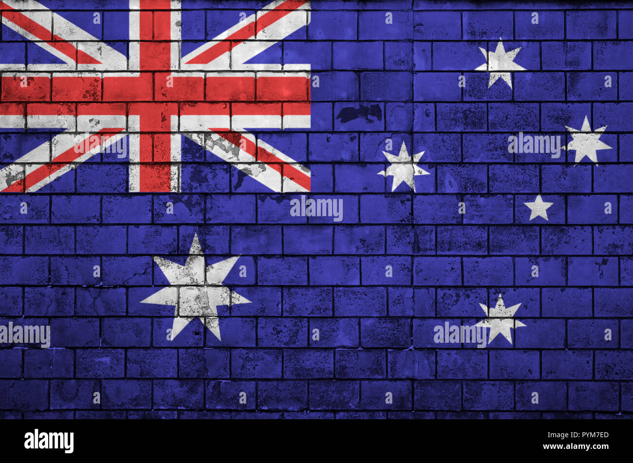 Australia flag is painted onto an old brick wall Stock Photo - Alamy