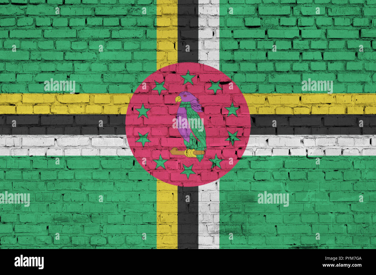 Dominica flag is painted onto an old brick wall Stock Photo - Alamy