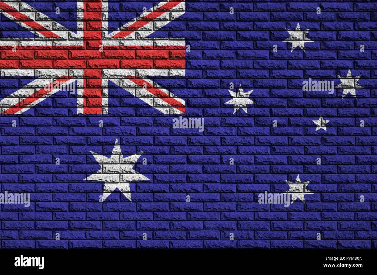Australia flag is painted onto an old brick wall Stock Photo - Alamy