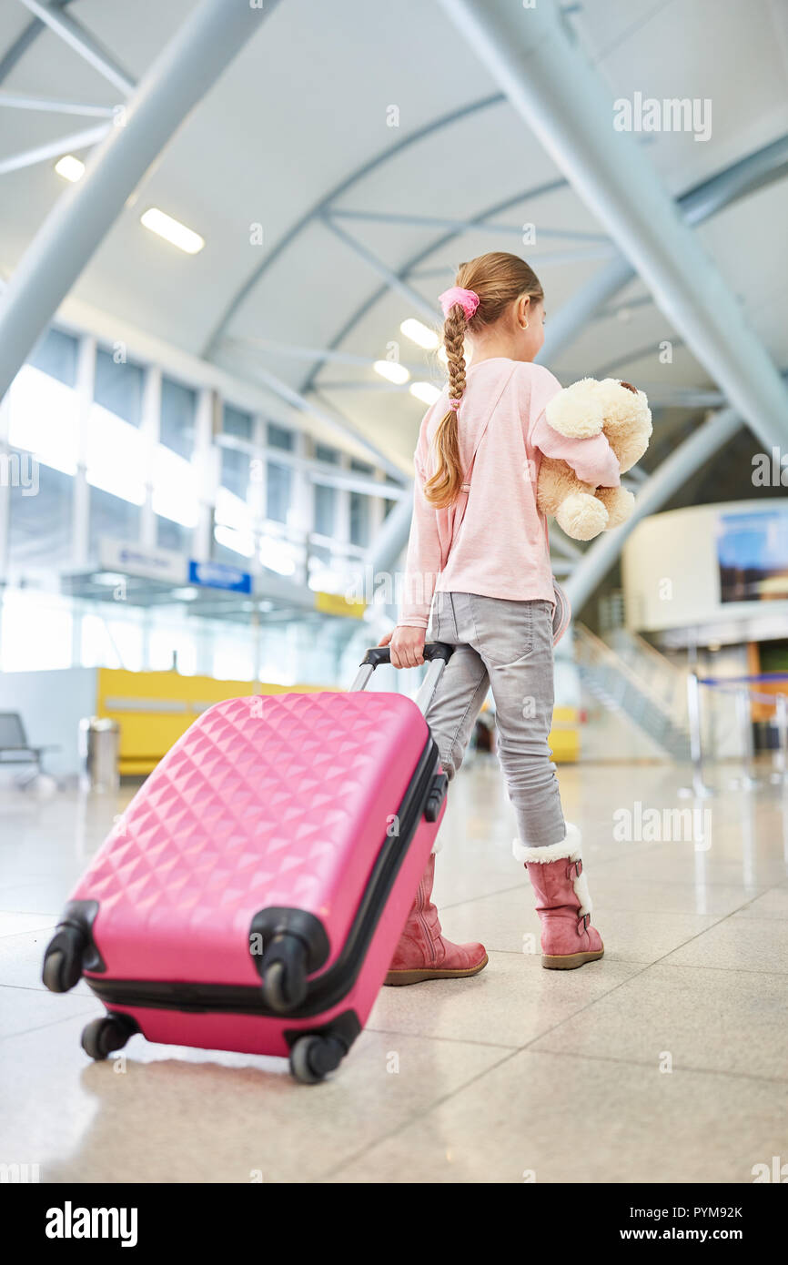 Little girl with suitcase sale