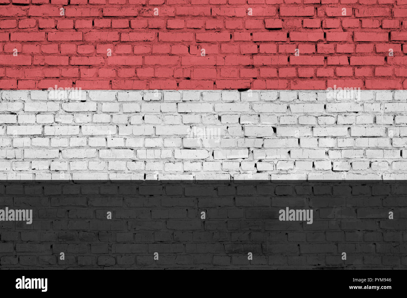 Yemen flag is painted onto an old brick wall Stock Photo - Alamy