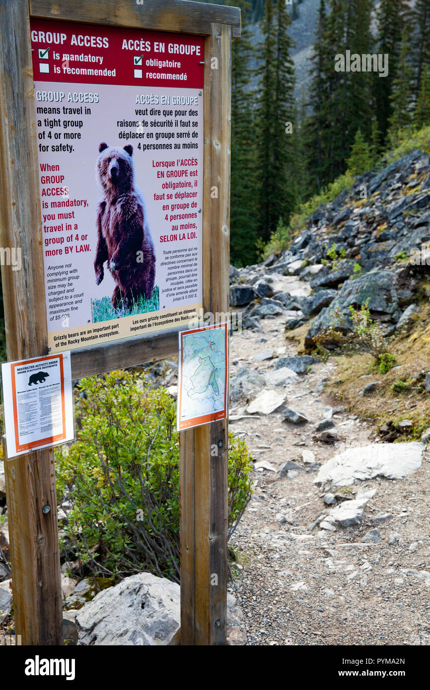 Bear warning sign at trailhead at Moraine lake, Alberta, Canada Stock Photo
