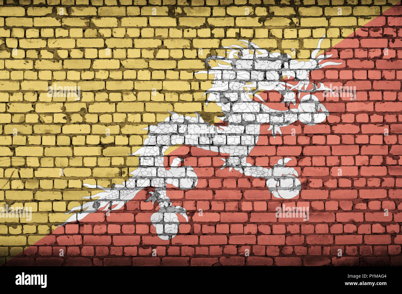 Bhutan flag is painted onto an old brick wall Stock Photo - Alamy