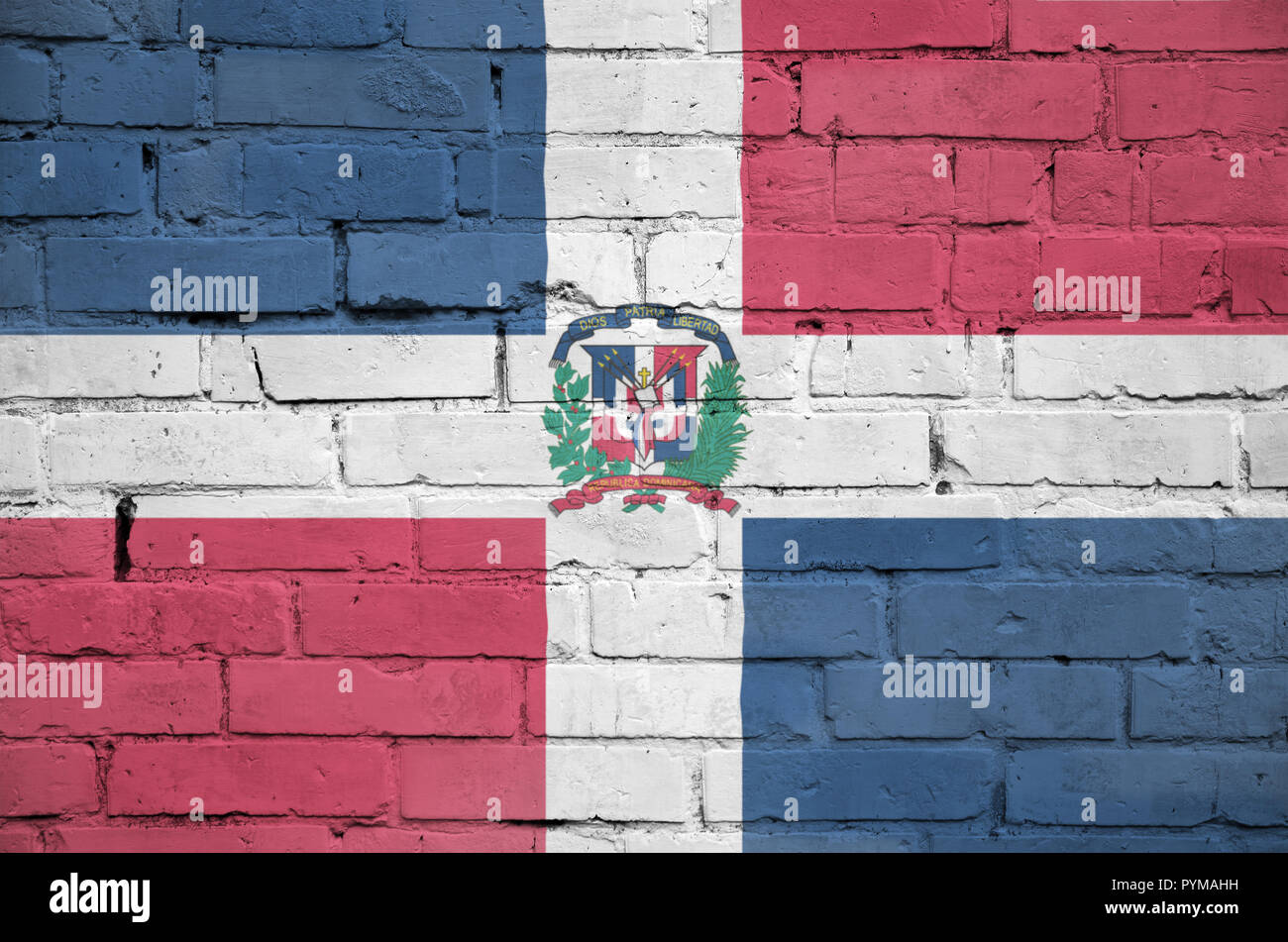 Dominican Republic flag is painted onto an old brick wall Stock Photo ...