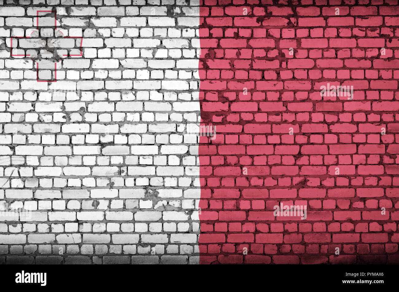 Malta flag is painted onto an old brick wall Stock Photo - Alamy