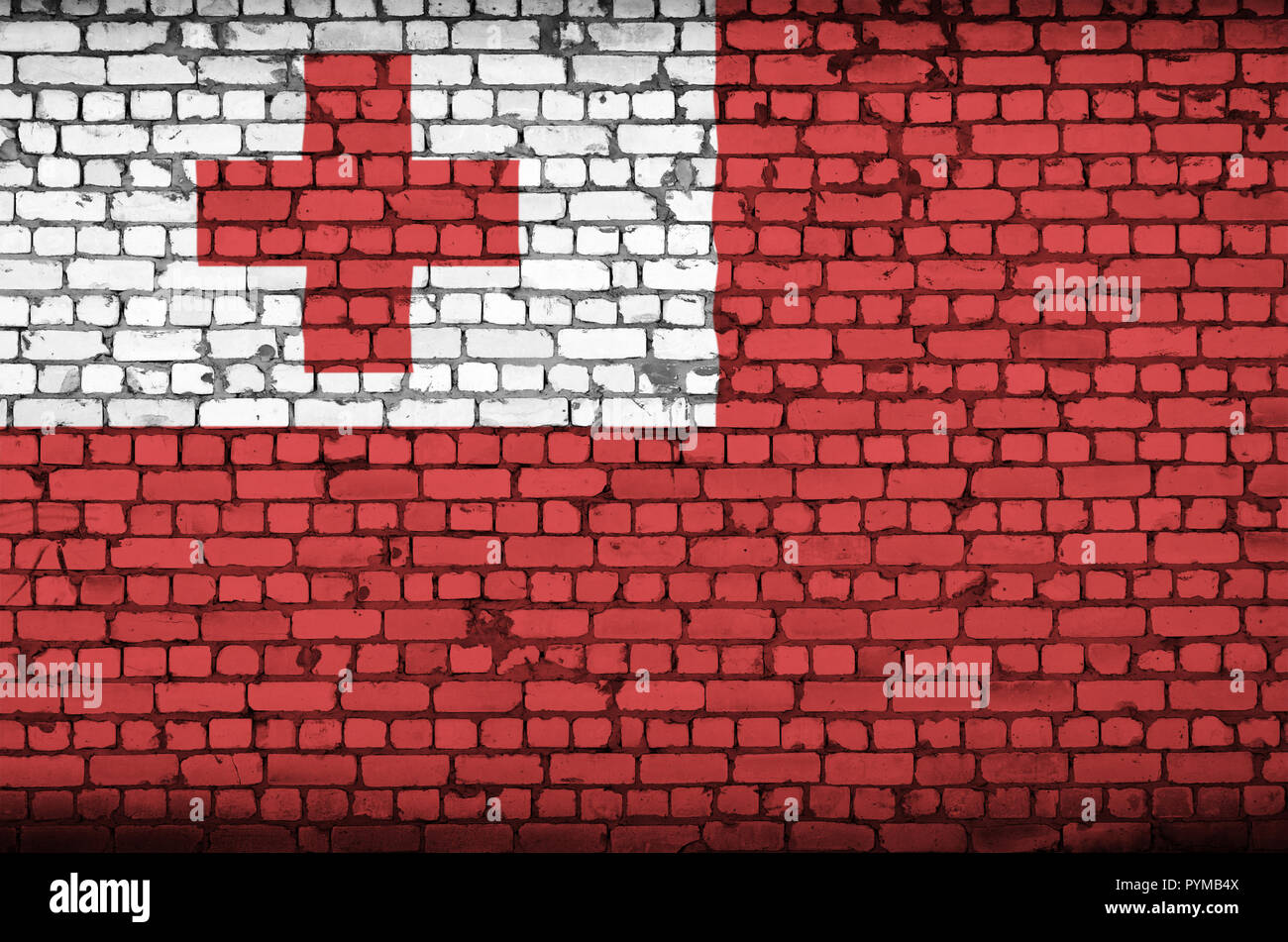 Tonga flag is painted onto an old brick wall Stock Photo - Alamy