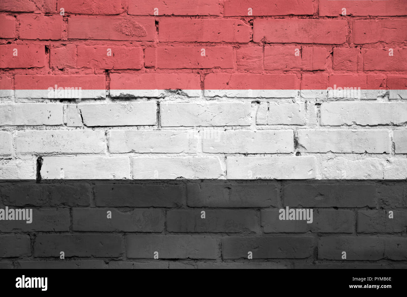 Yemen flag is painted onto an old brick wall Stock Photo - Alamy