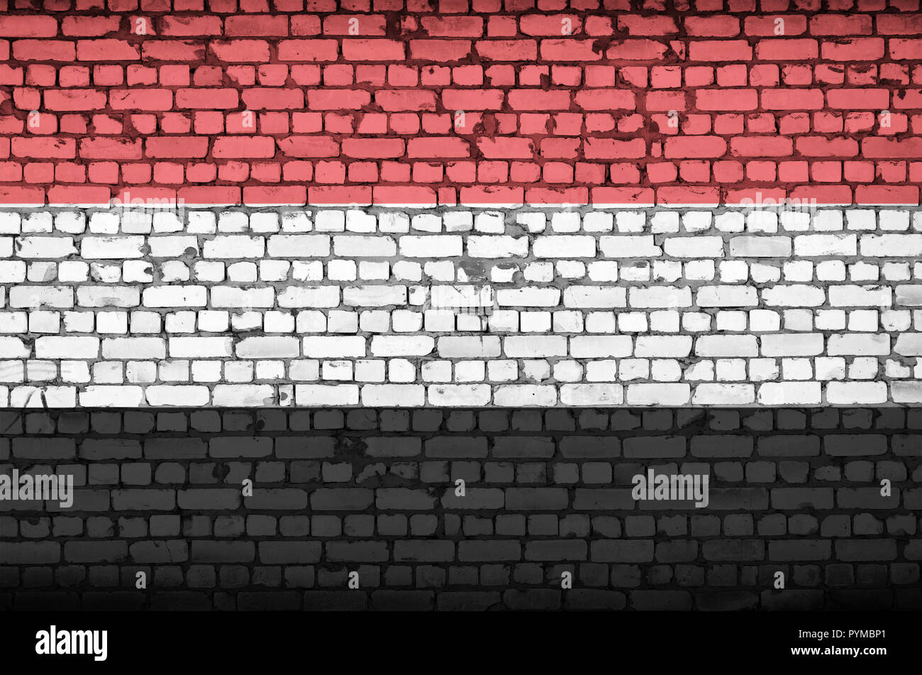 Yemen flag is painted onto an old brick wall Stock Photo - Alamy
